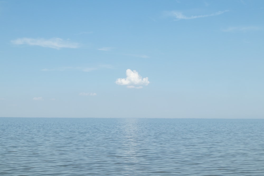 blue ocean under blue sky during daytime