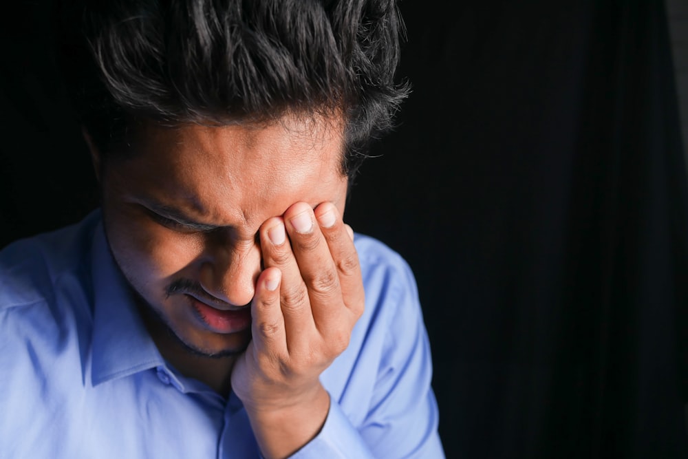 man in blue dress shirt