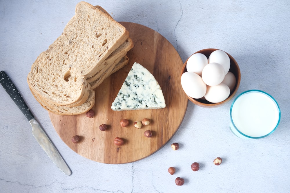 sliced bread on brown wooden chopping board