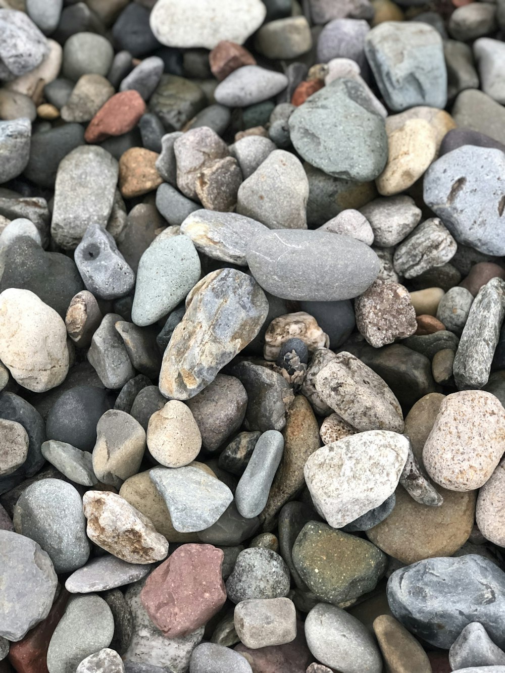 gray and black stones on the ground