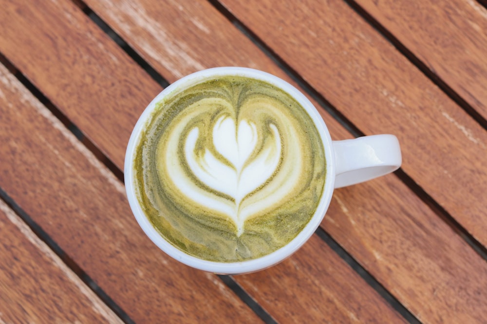 white ceramic mug with coffee