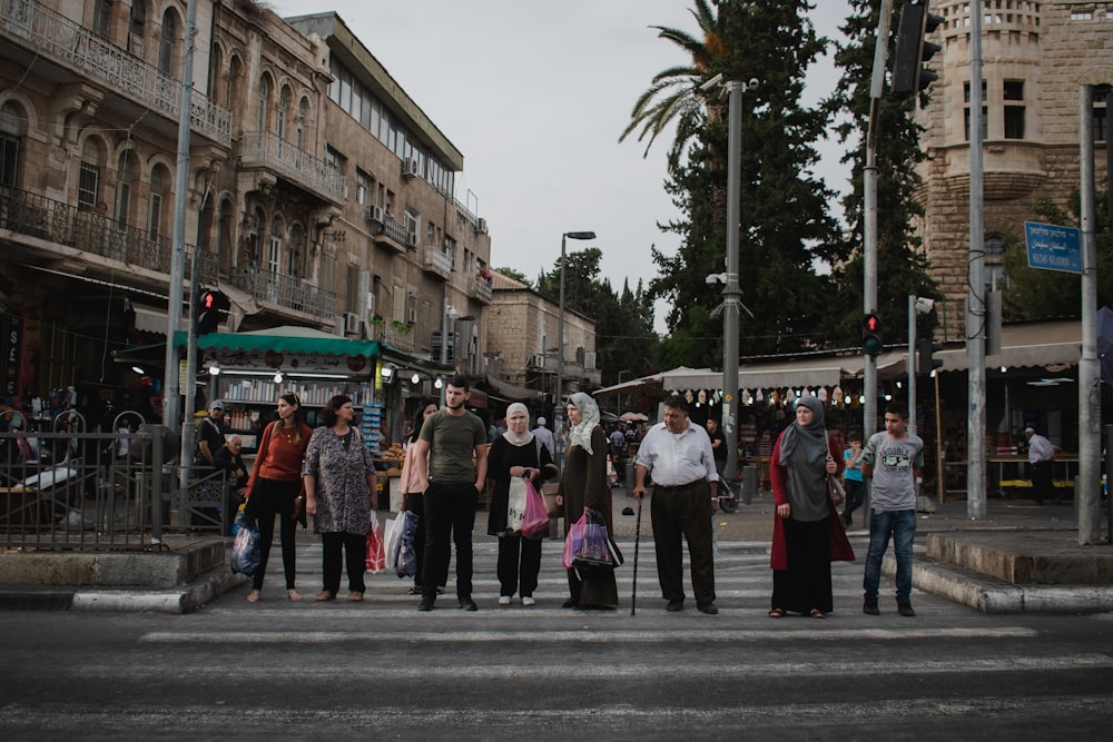 people standing on street during daytime