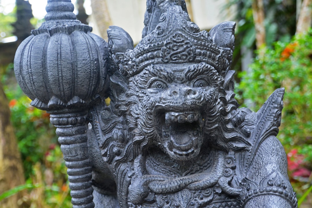 gray concrete statue during daytime