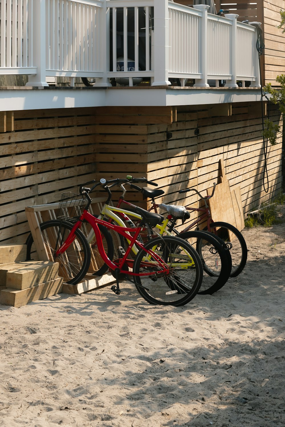 a couple of bikes parked next to a building