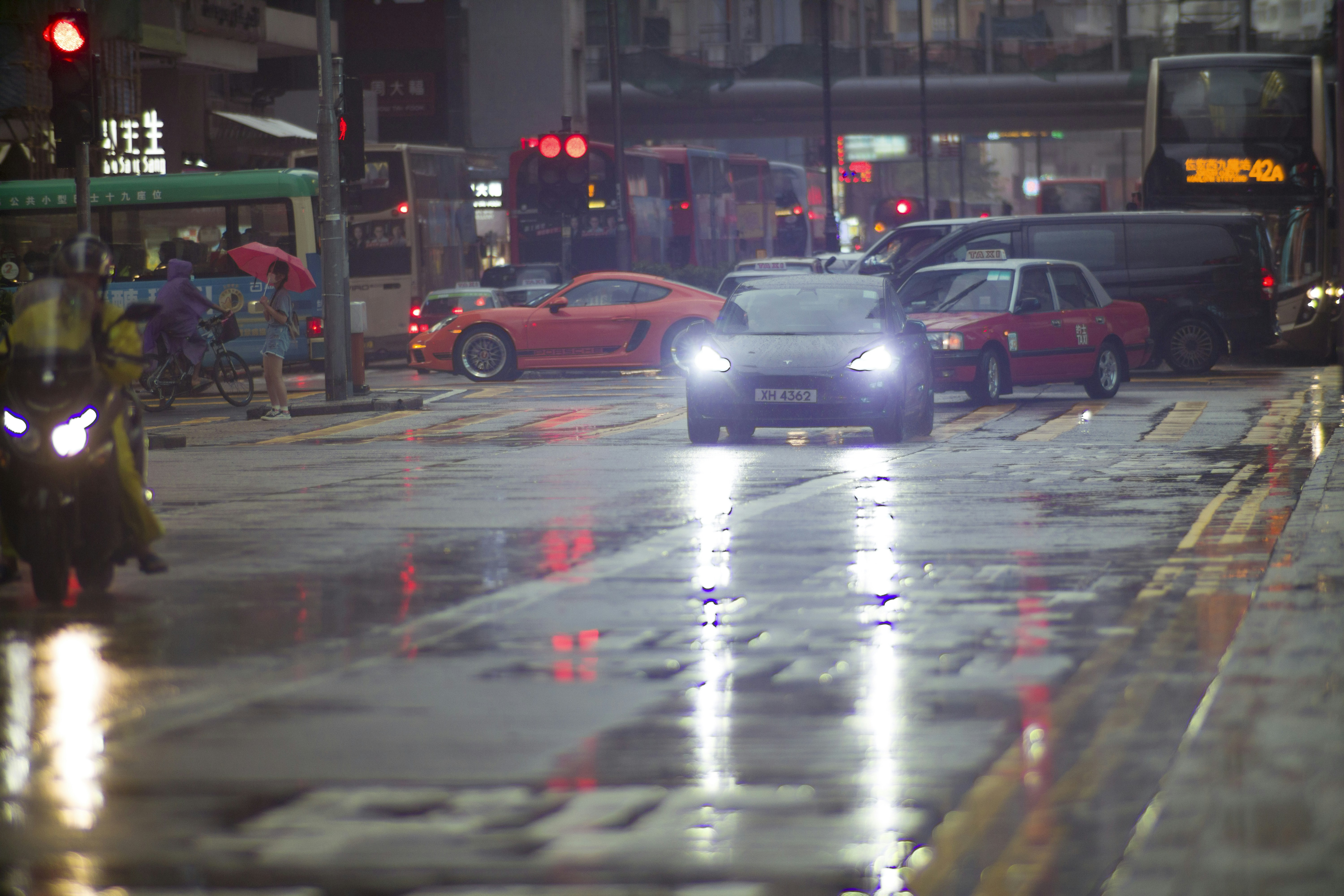 Chevrolet Bolt EUV driving on a city street, representing a common EV choice for Torrance shoppers