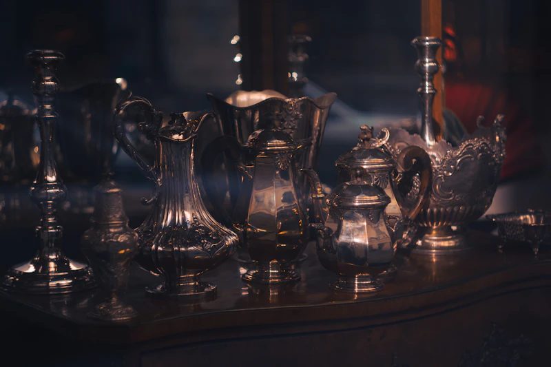 Sell silver holloware NYC — tea sets pitchers