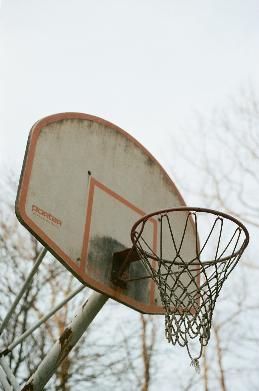 basketball hoop in grayscale photography