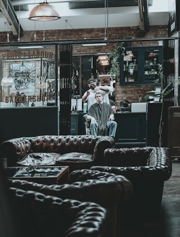 A stylish barbershop interior with modern decor.