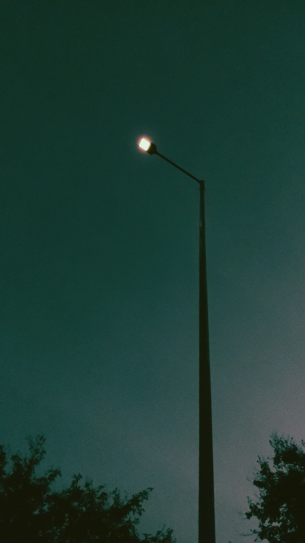 black street light during night time