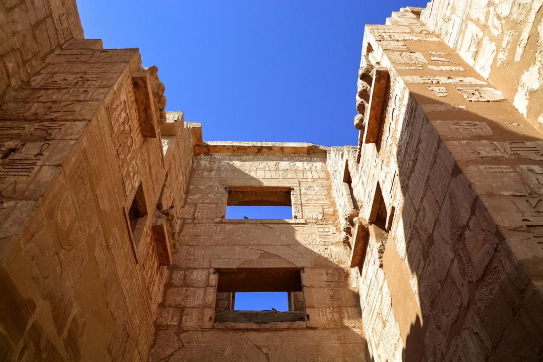 brown concrete building under blue sky during daytime