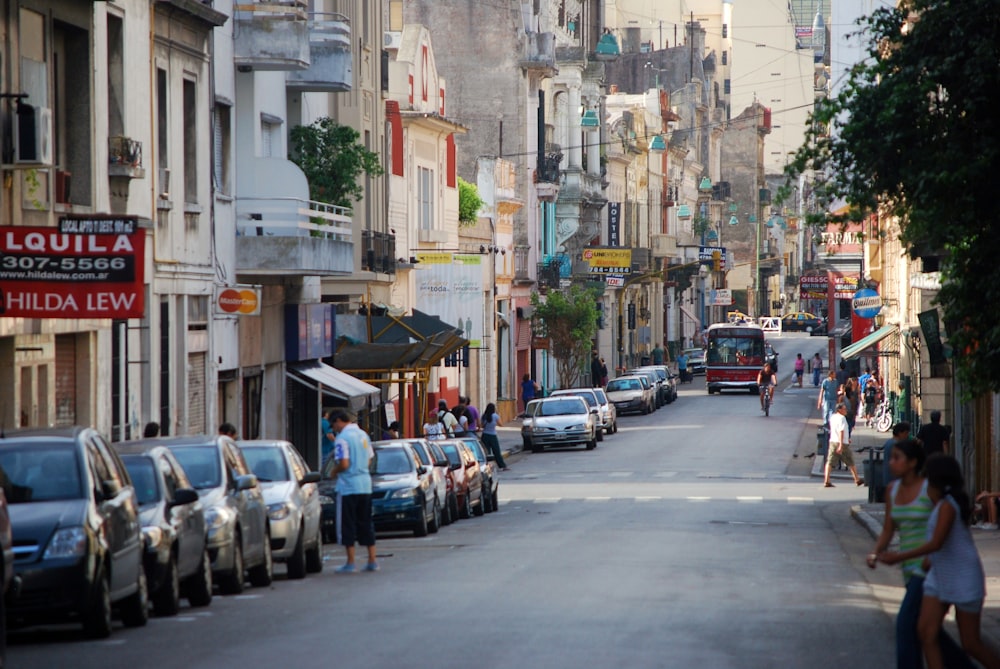 cars parked on street near buildings during daytime