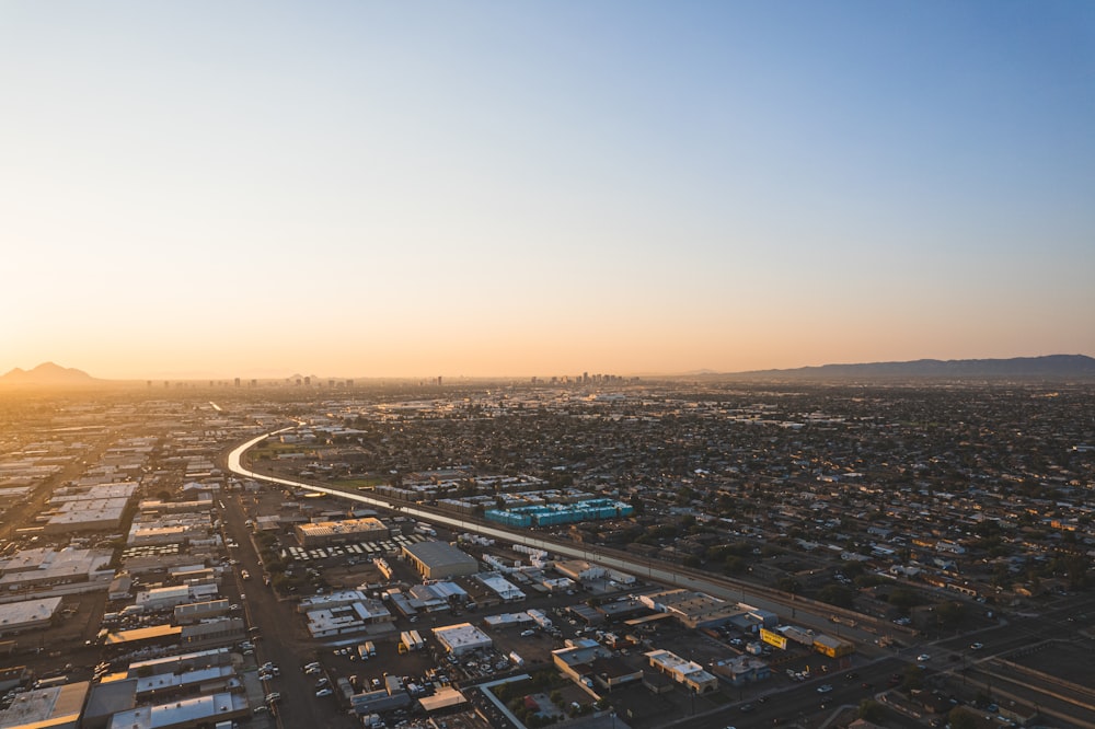 aerial view of city buildings during sunset