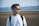 man in white crew neck shirt wearing black sunglasses