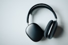 black wireless headphones on white desk