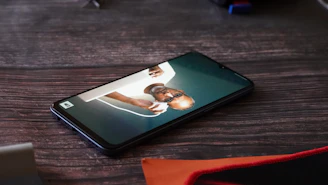A smartphone showing a short video playing in portrait mode.