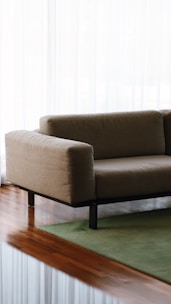 gray and black padded armchair
