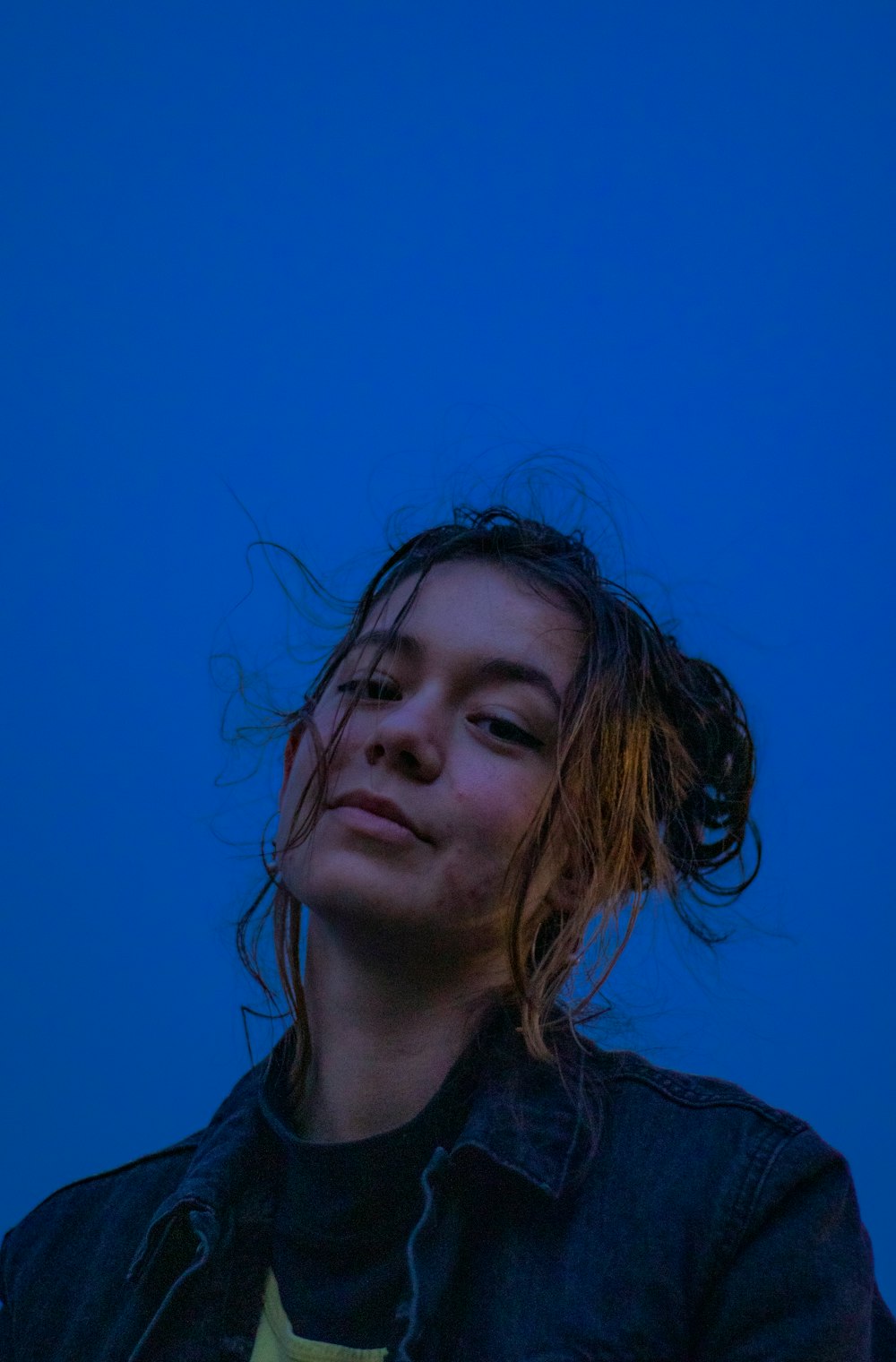 girl in black shirt with brown hair