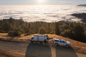 Guests enjoying panoramic views of the sea of clouds from the jeep tour in Kintamani.