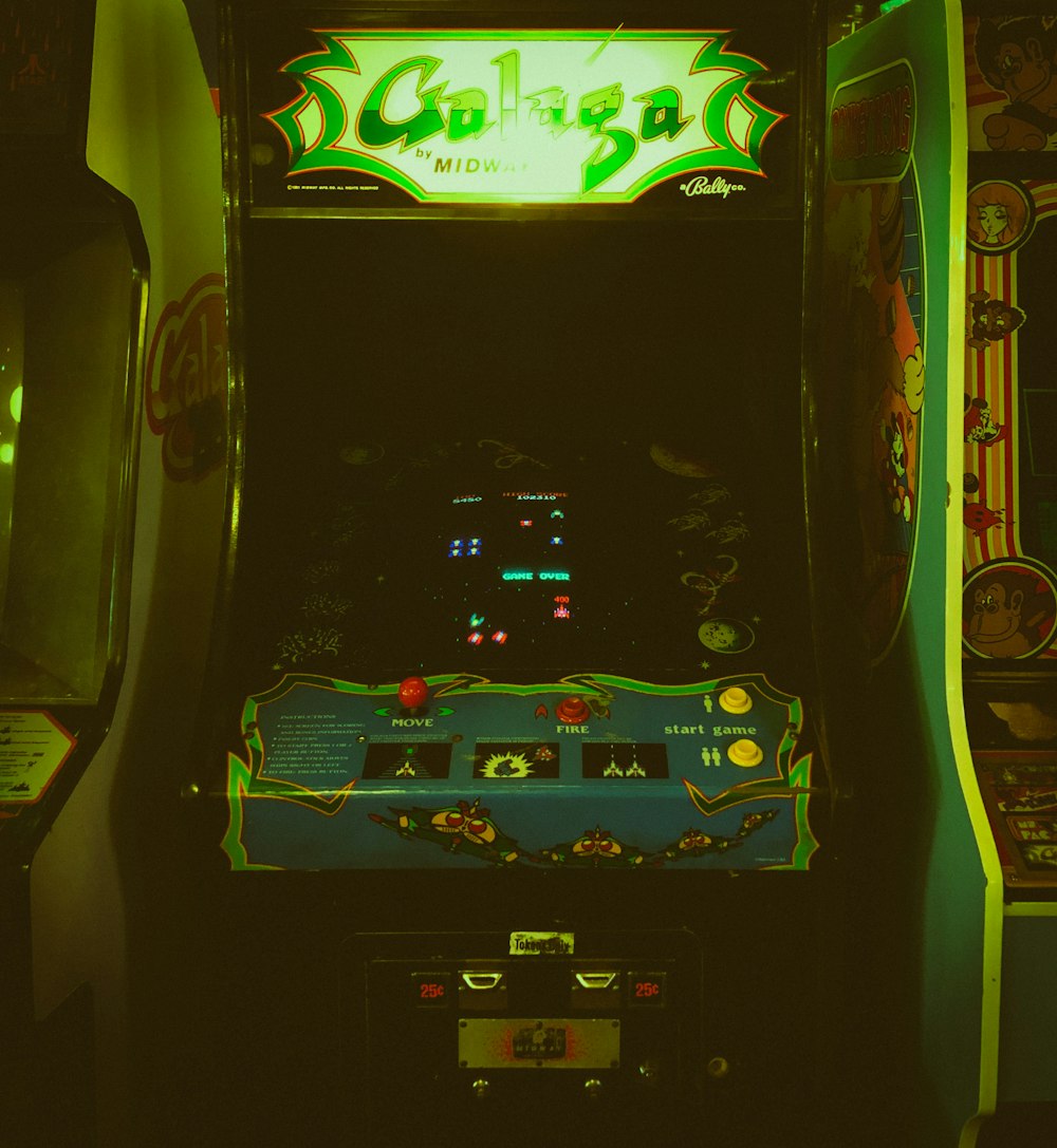 black and blue arcade machine