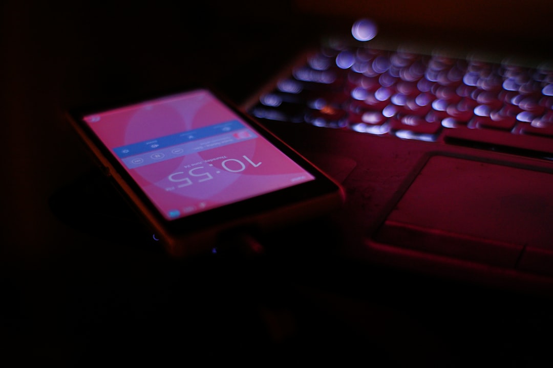 black ipad on brown wooden table, Old Phone