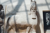 white and black concrete statue