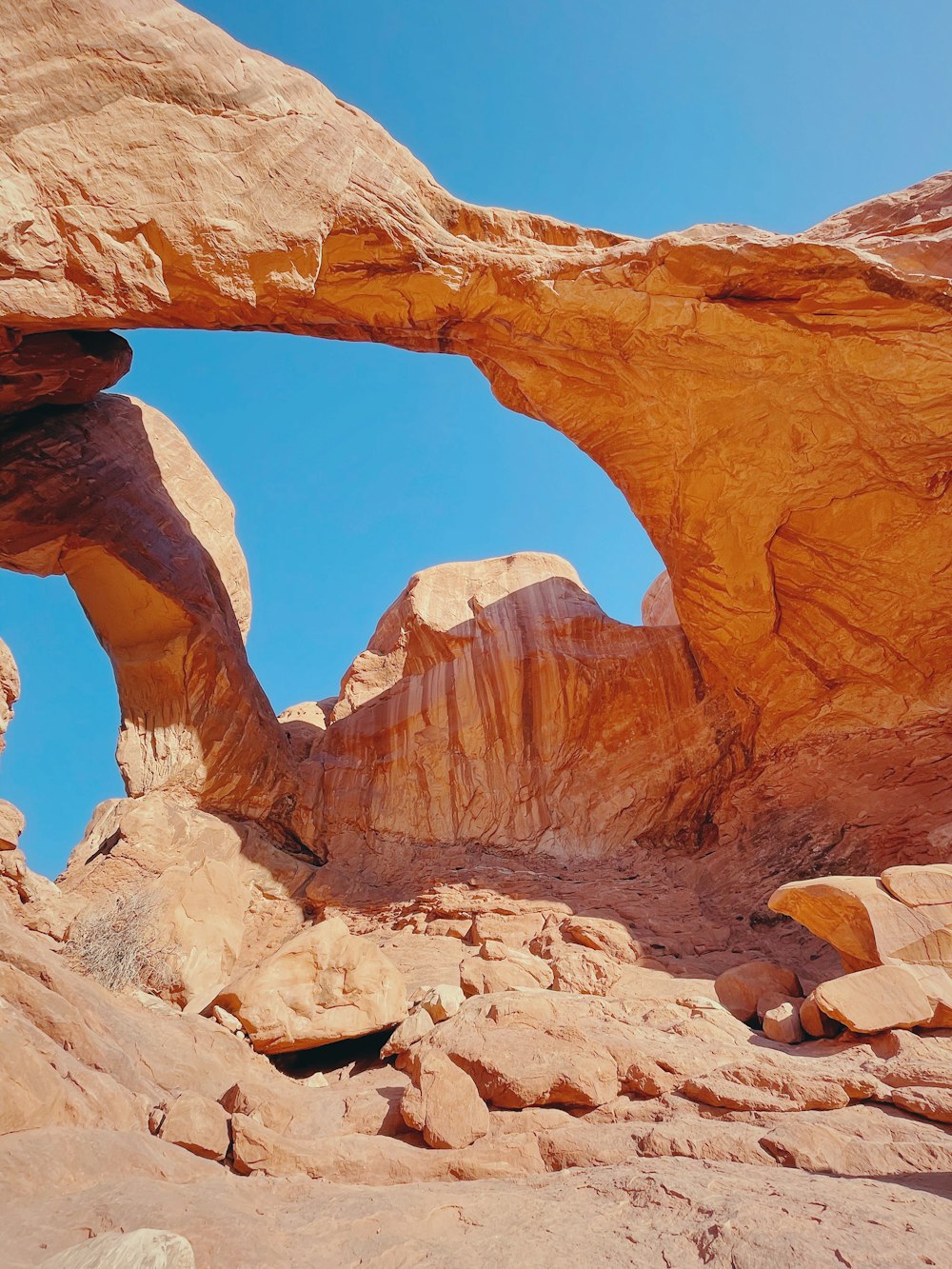 brown rock formation under blue sky during daytime