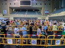 people sitting on yellow chairs