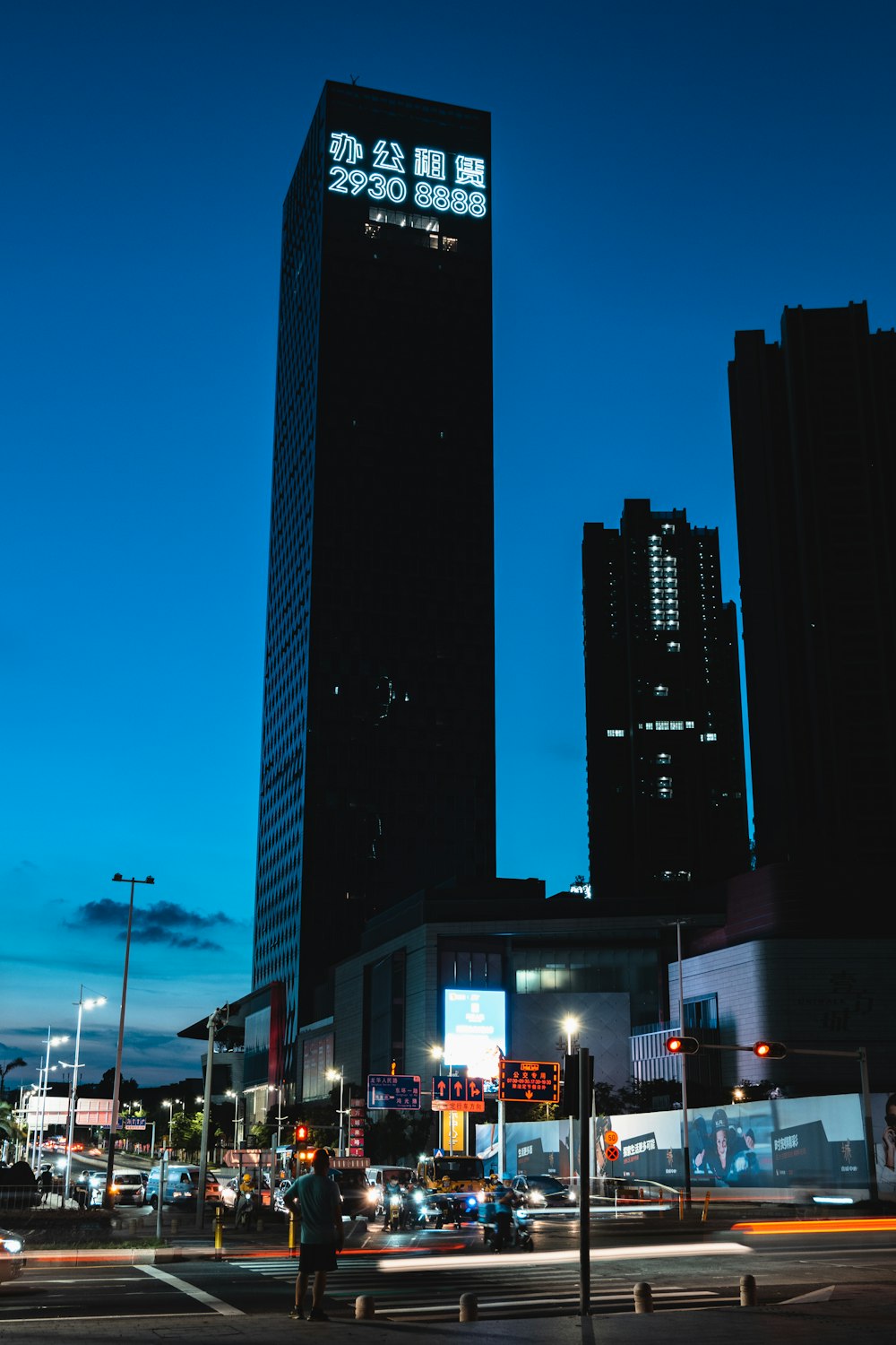 black high rise building during night time