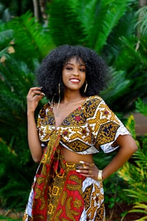 woman in brown and white floral dress