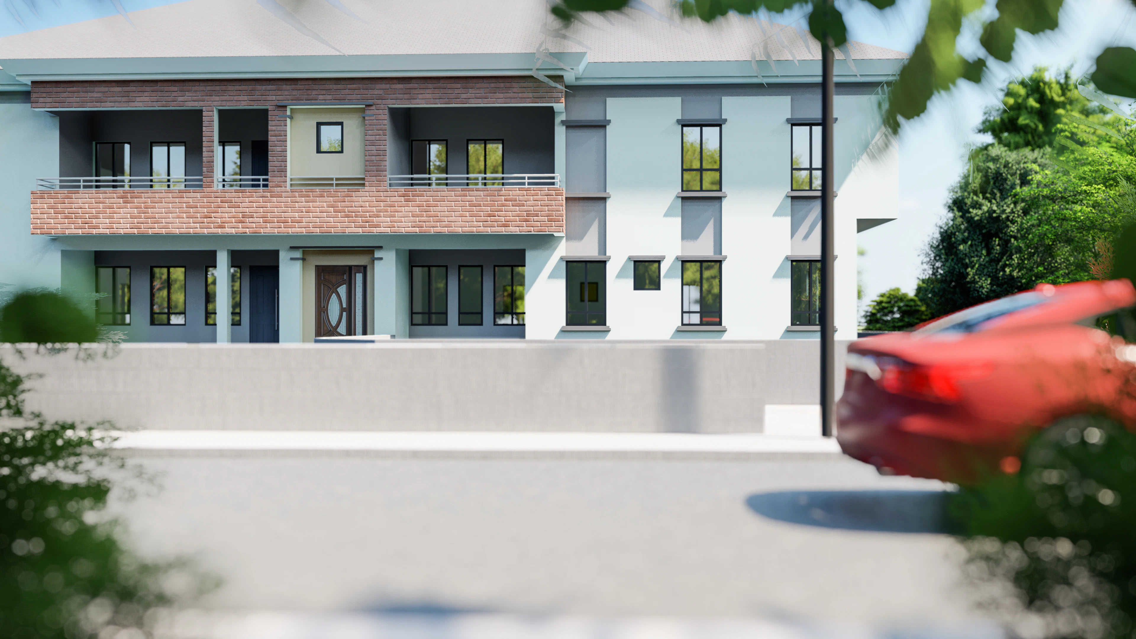 Row of terrace duplexes with a car parked outside