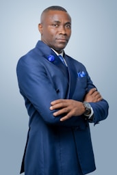 man in blue suit jacket