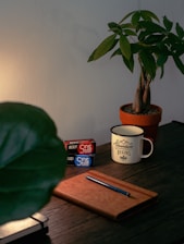 white ceramic mug on brown wooden table