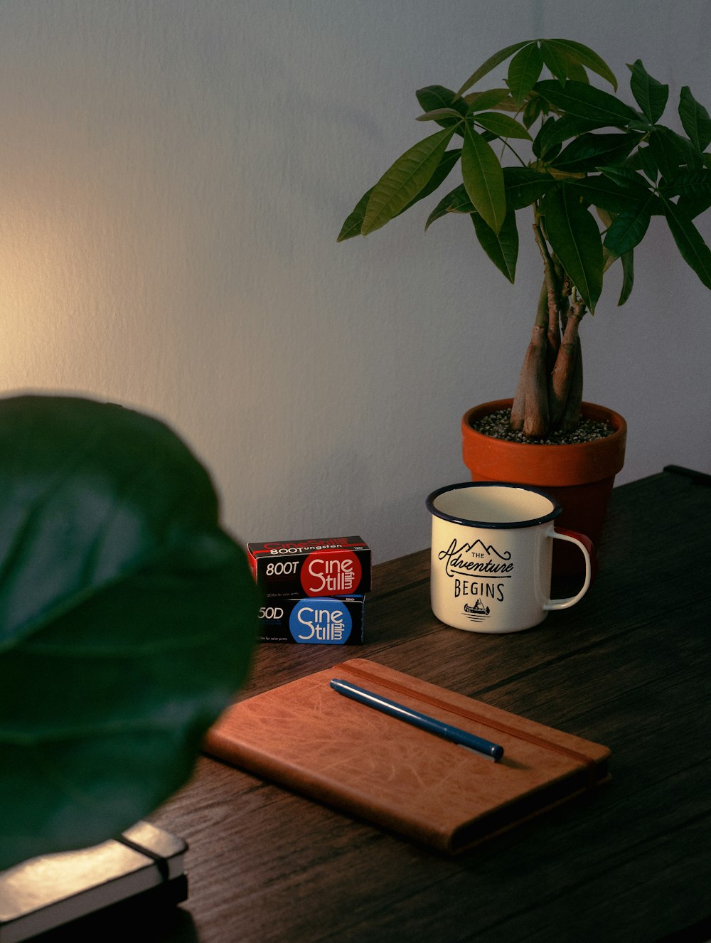 white ceramic mug on brown wooden table