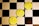 Three gold coins with the Ethereum logo and text are placed diagonally on a black and white checkerboard surface.
