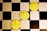 Three gold coins with the Ethereum logo and text are placed diagonally on a black and white checkerboard surface.