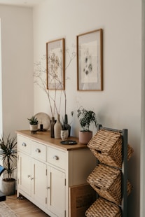 brown woven basket on white wooden cabinet