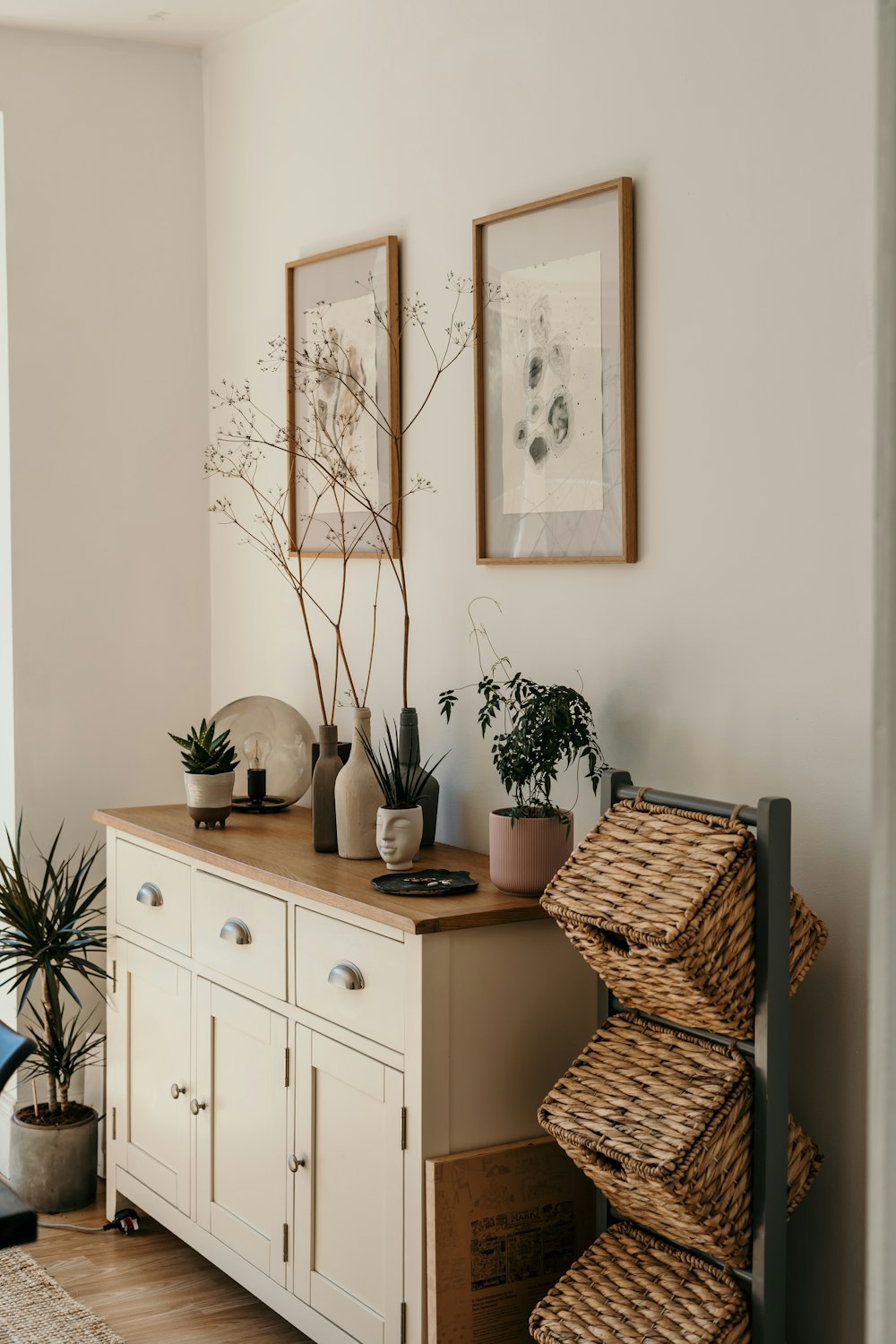 brown woven basket on white wooden cabinet