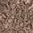 Dry, crumpled tea leaves form a densely packed texture. The leaves are dark and appear aged, with a mix of curled and twisted shapes.
