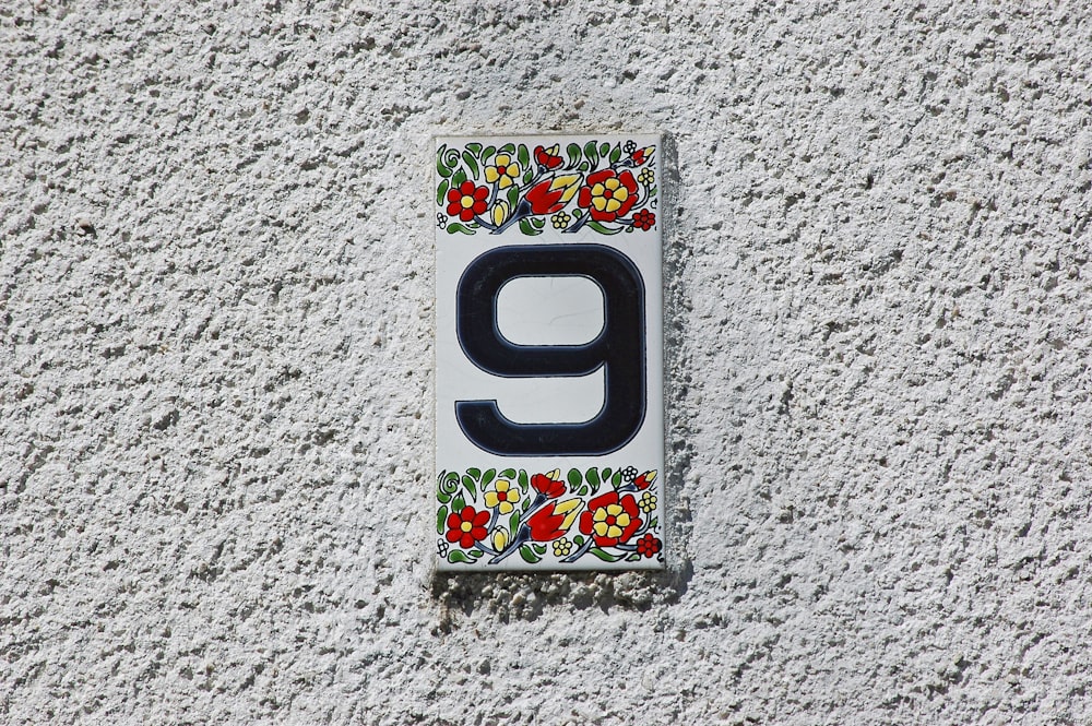white red and green number 9 card