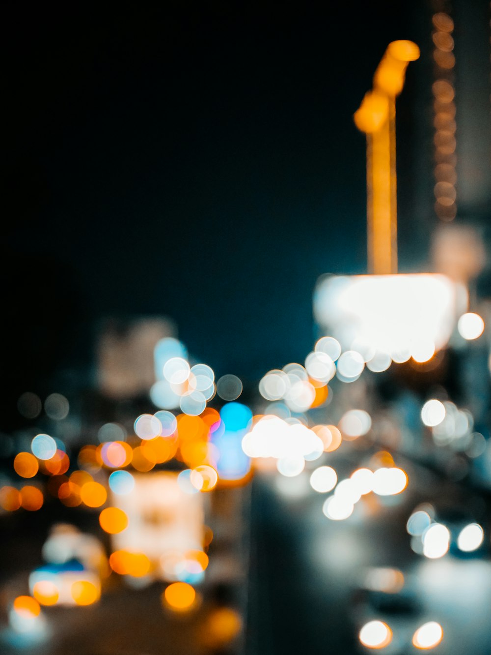 Photographie bokeh des lumières de la ville pendant la nuit