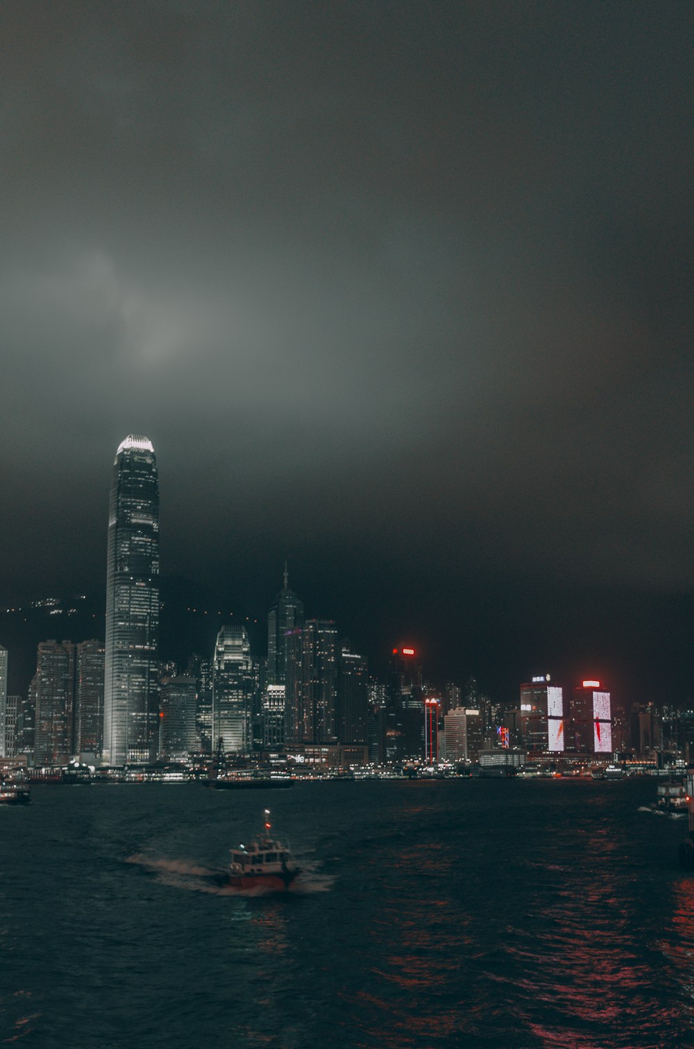 city skyline during night time