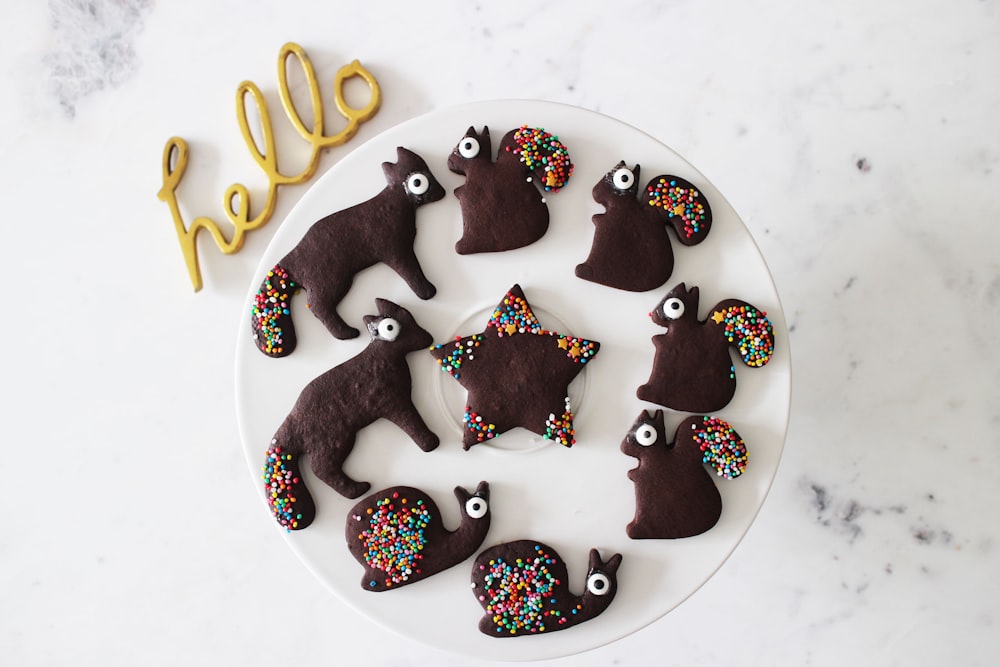 chocolate cookies on white ceramic plate