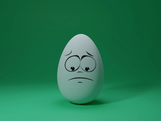 white egg with face illustration