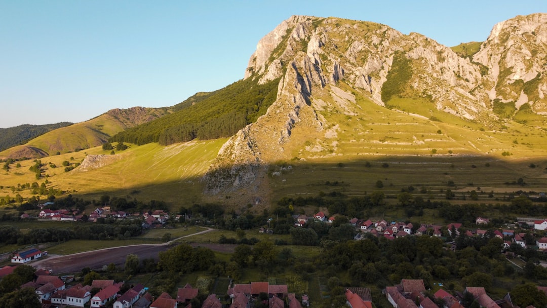 green and brown mountain under blue sky during daytime