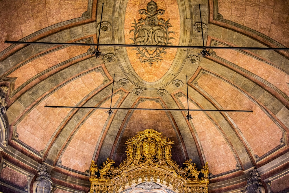 brown and white ceiling with gold ceiling