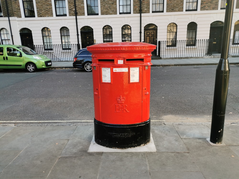 red mail box on road