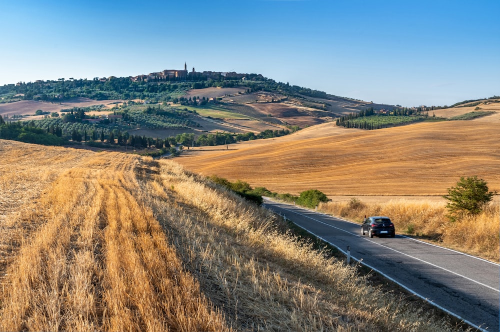 black car on road during daytime