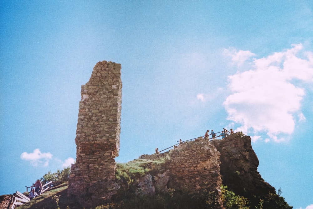 brown brick tower under blue sky during daytime