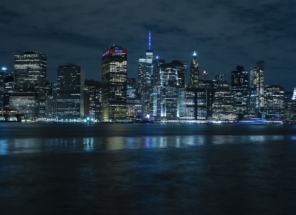 city skyline during night time