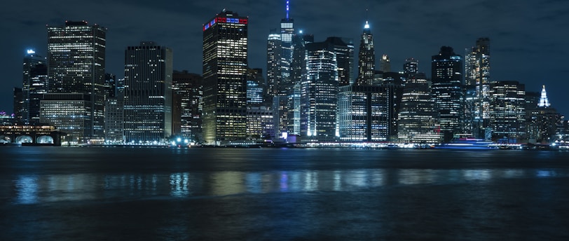 city skyline during night time